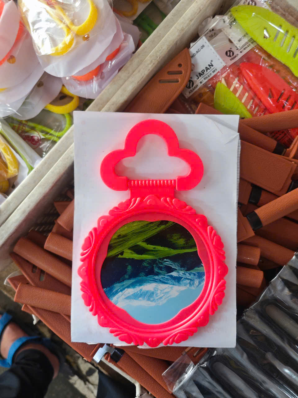 Gương tròn cầm tay